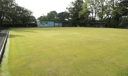 Crown green bowling pitch and club house.