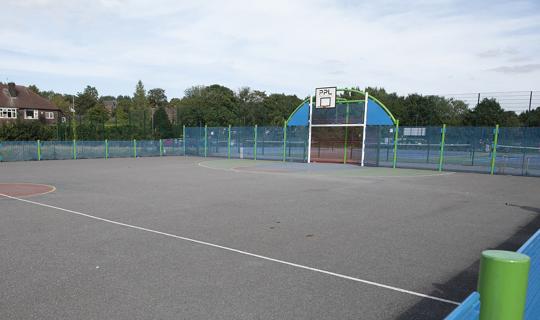 Fenced multi-ball goals and play area.