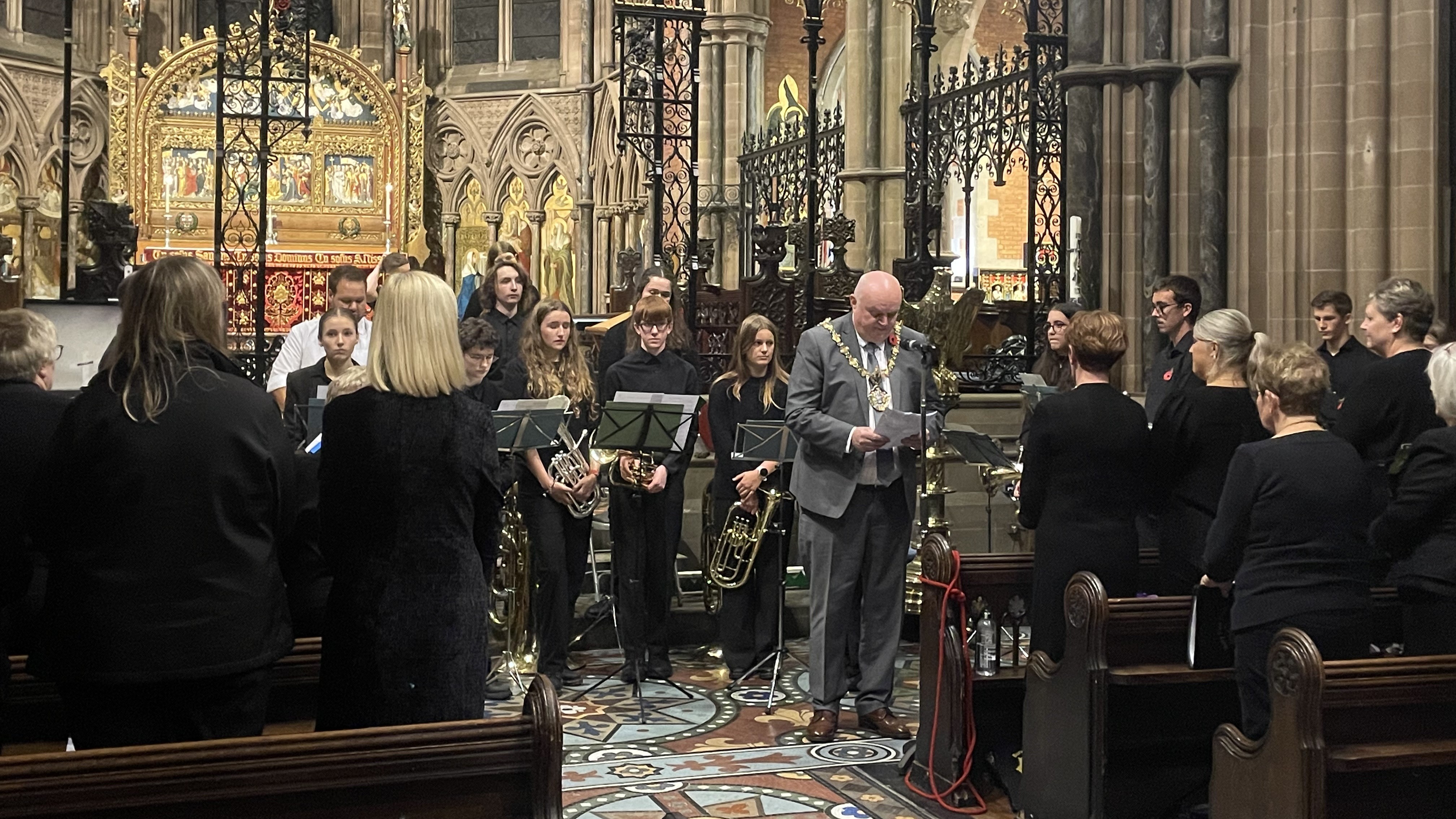 The mayor speaking at the event