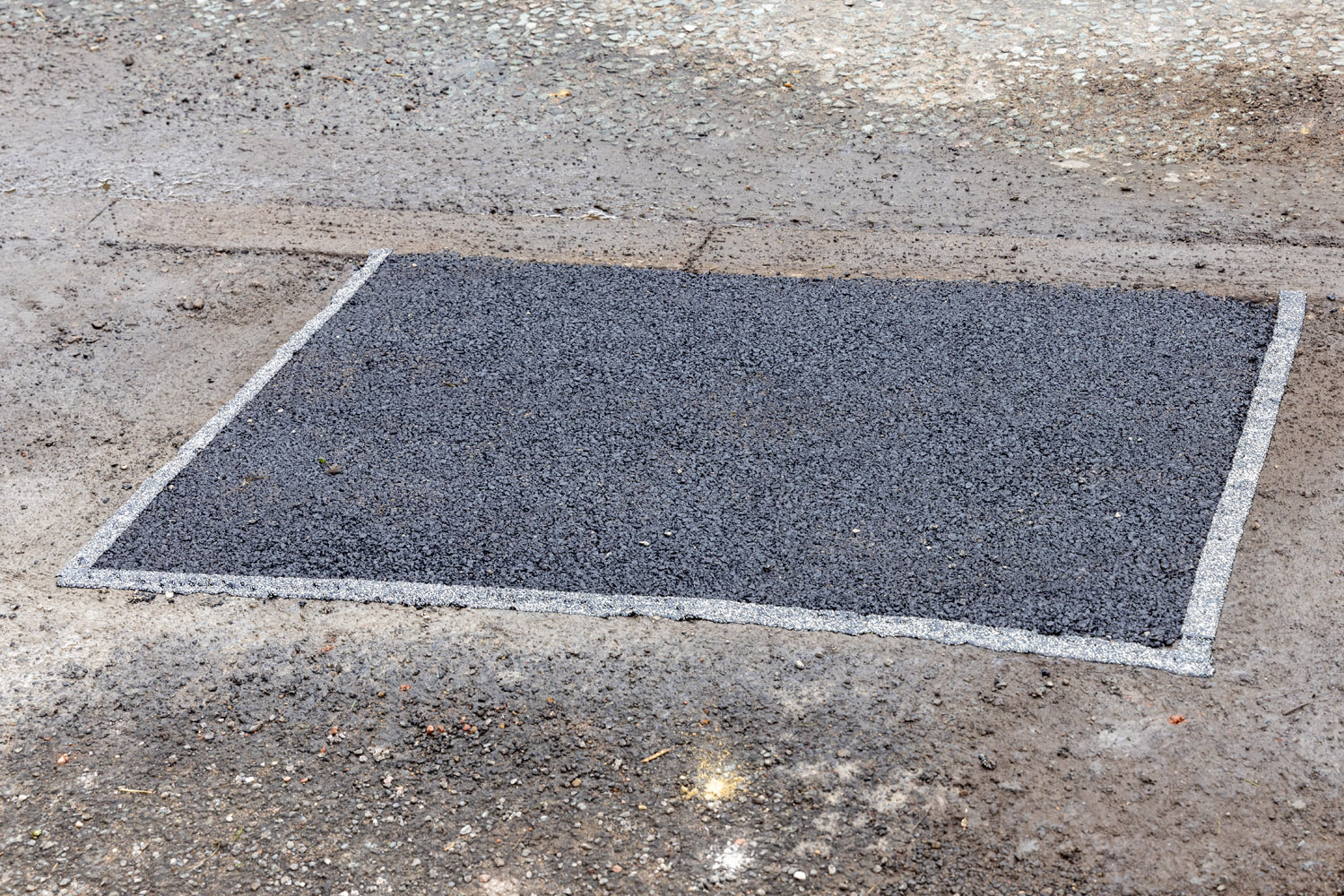 Patch of tarmac on a road surface