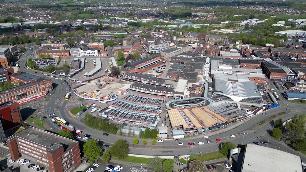 Aerial view of a town centre surrounded by roads