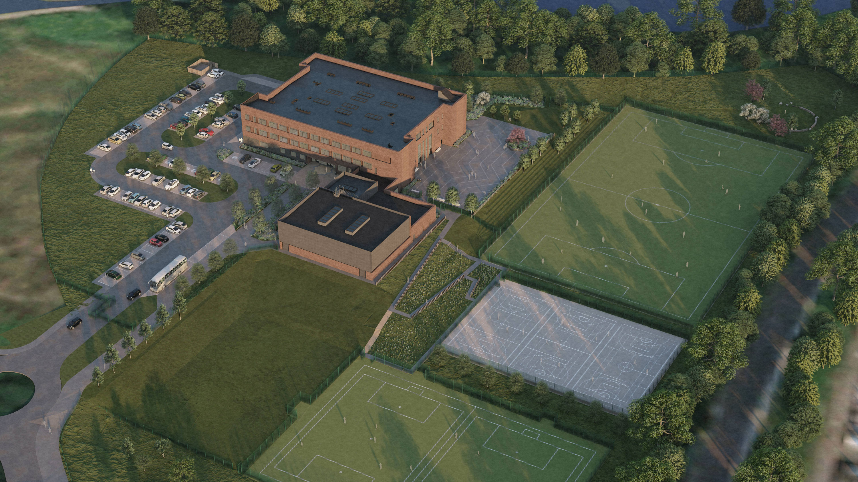 Computer generated image of an aerial view of a school building and sports pitches surrounded by grass and trees 