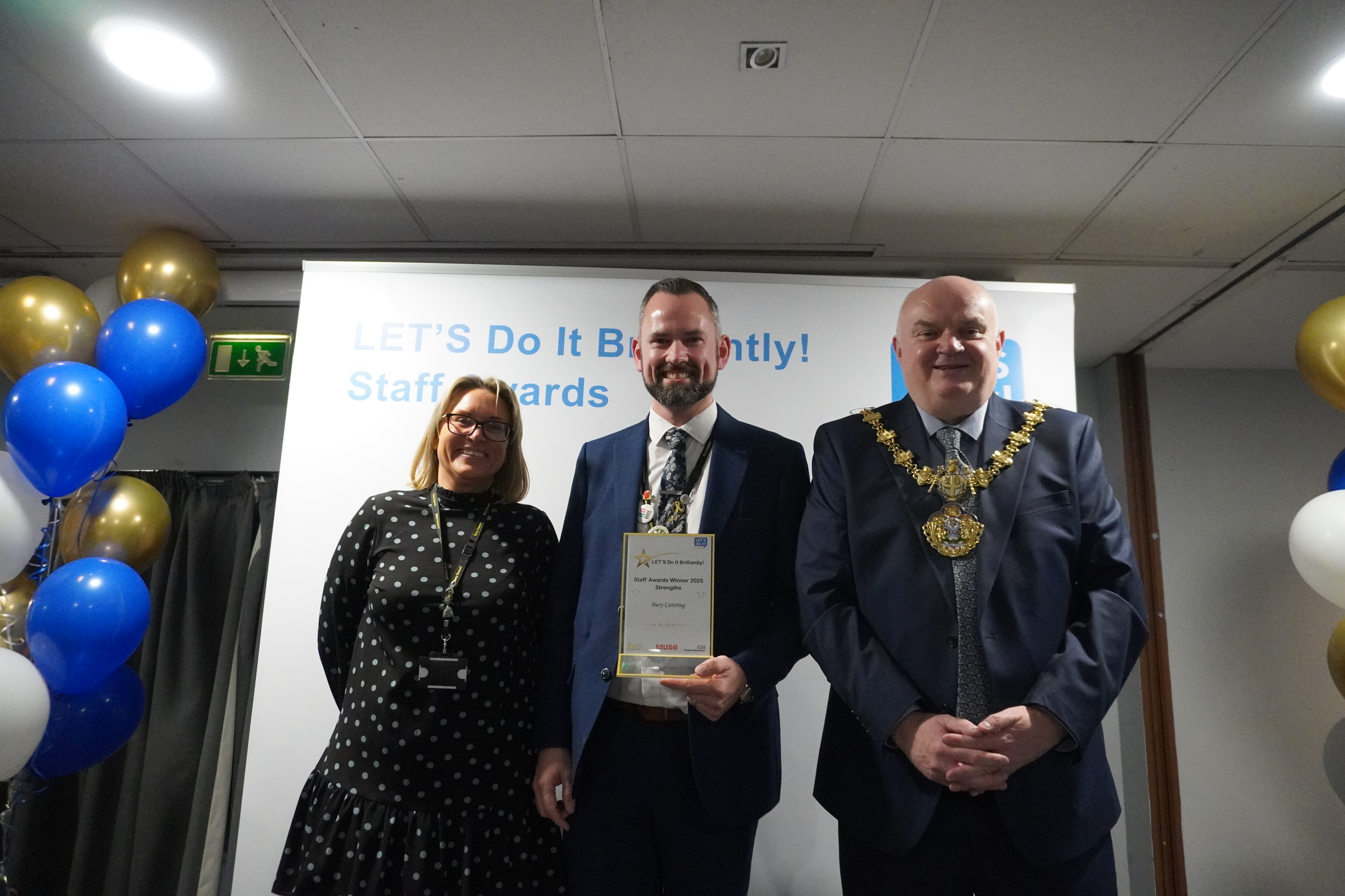 People holding awards