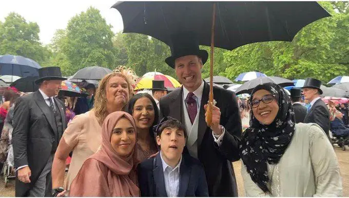 Picture of members of Bury People First with Prince William at Buckingham Palace garden party