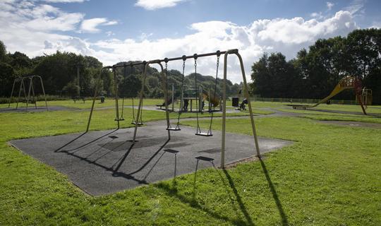 Swings in a play area.
