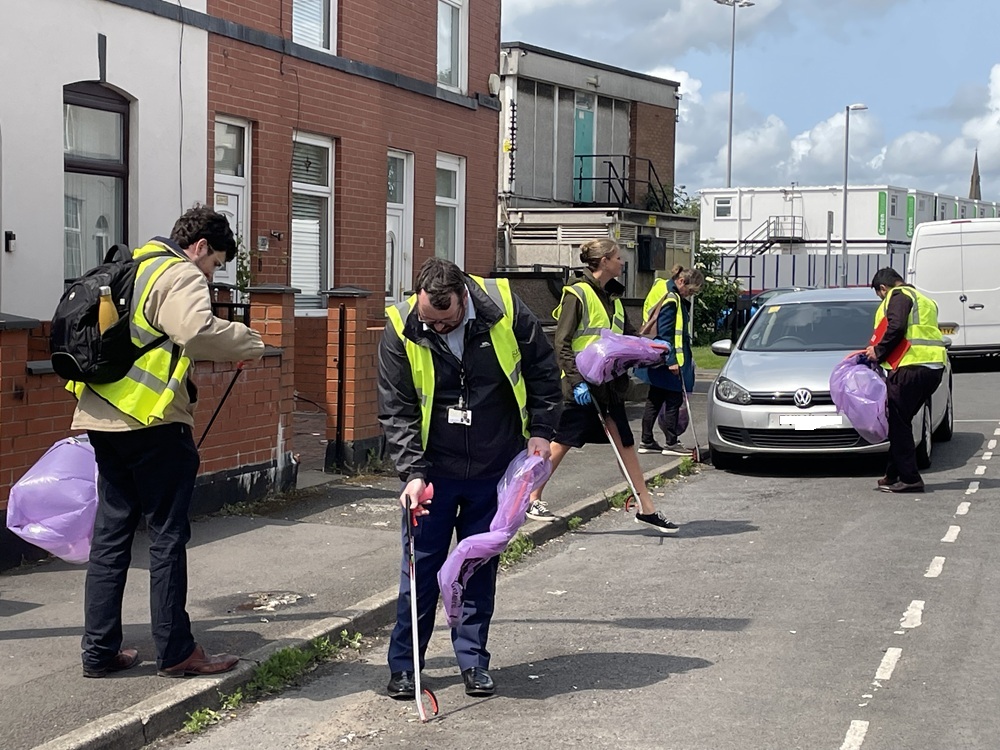 People picking up litter