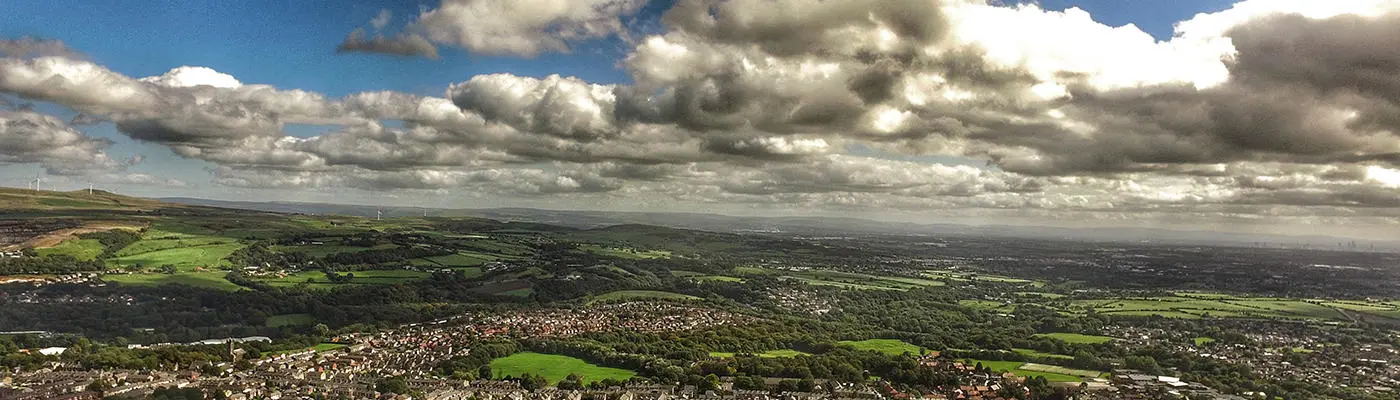 Aerial view of a town showing buildings and fields