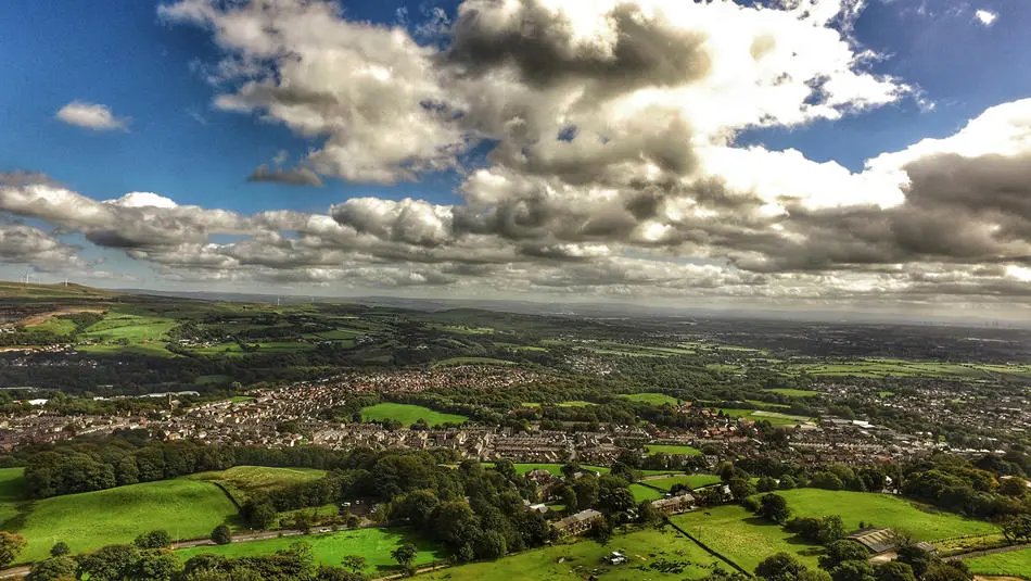 Aerial view of the a town showing buildings and fields