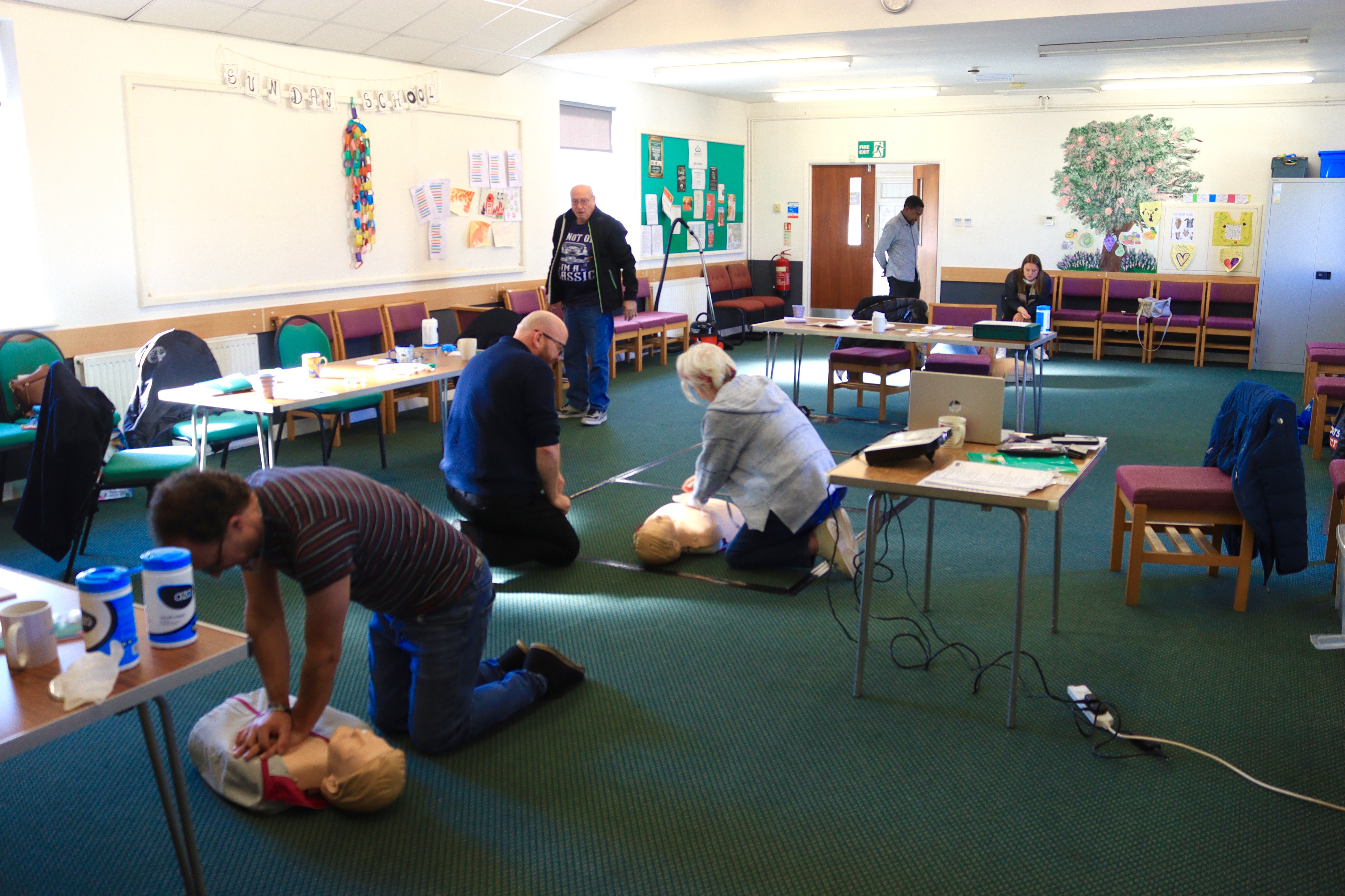 people practicing first aid