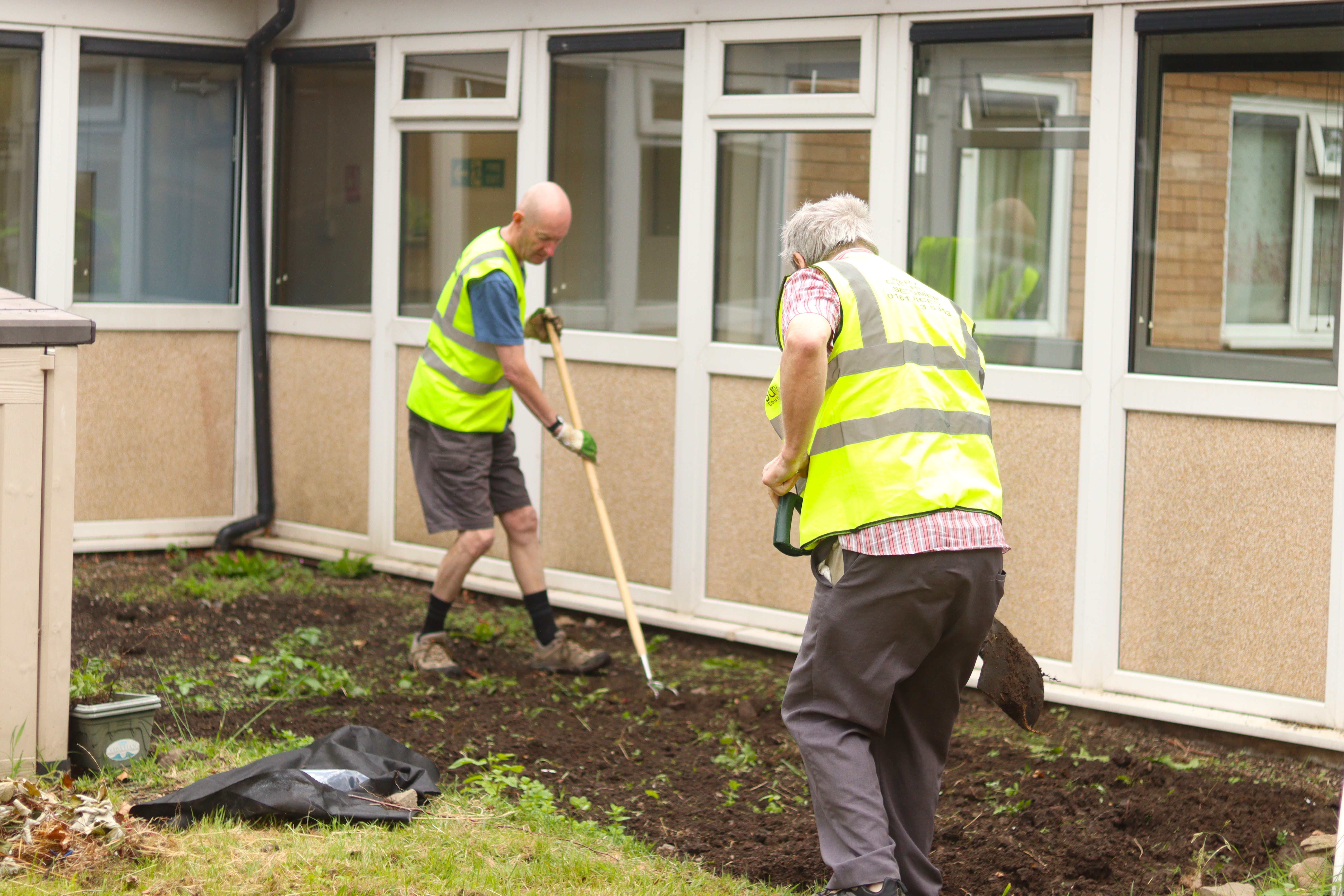 volunteers digging