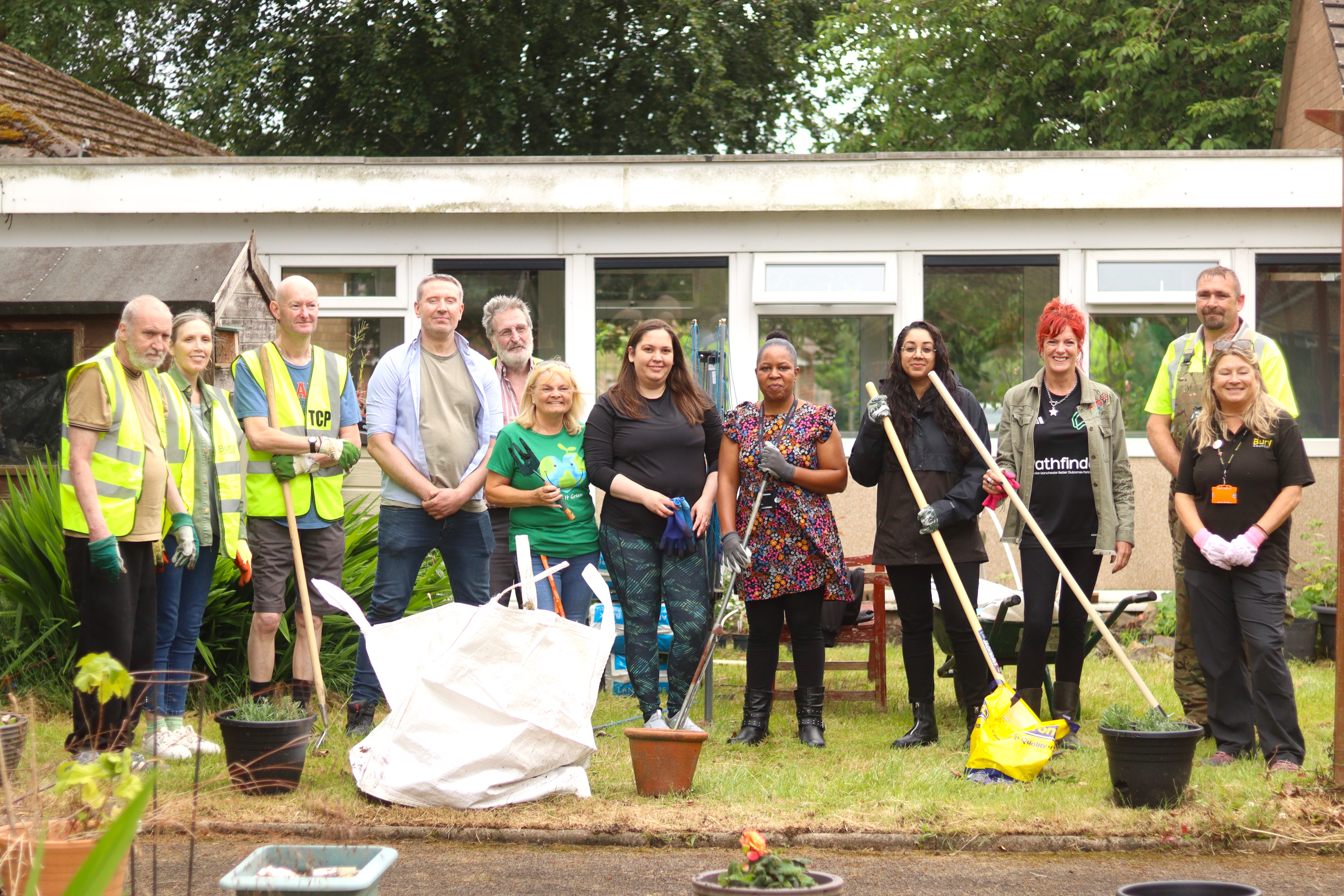 staff and volunteers at the hardwood house gardening day