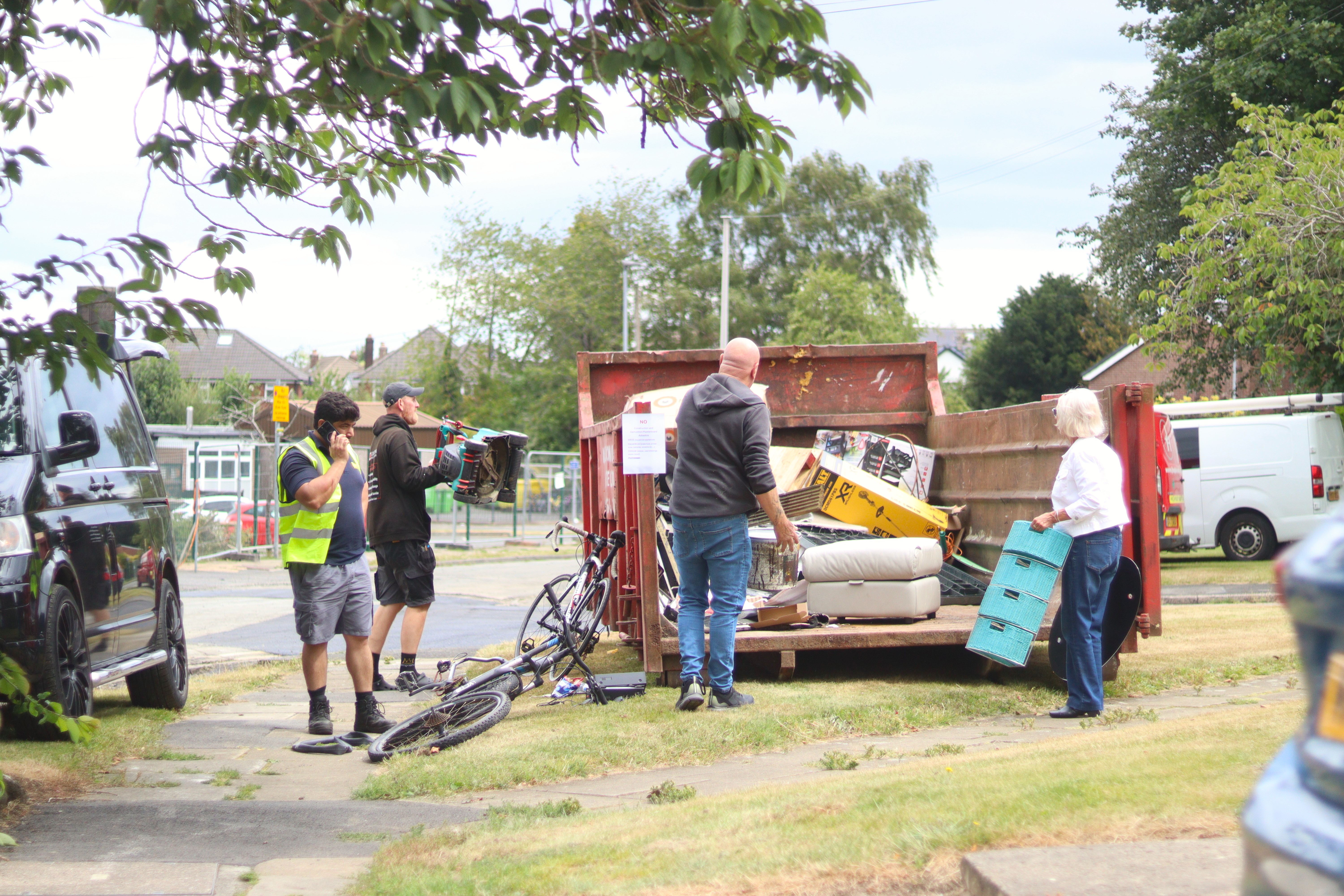 residents loading skip
