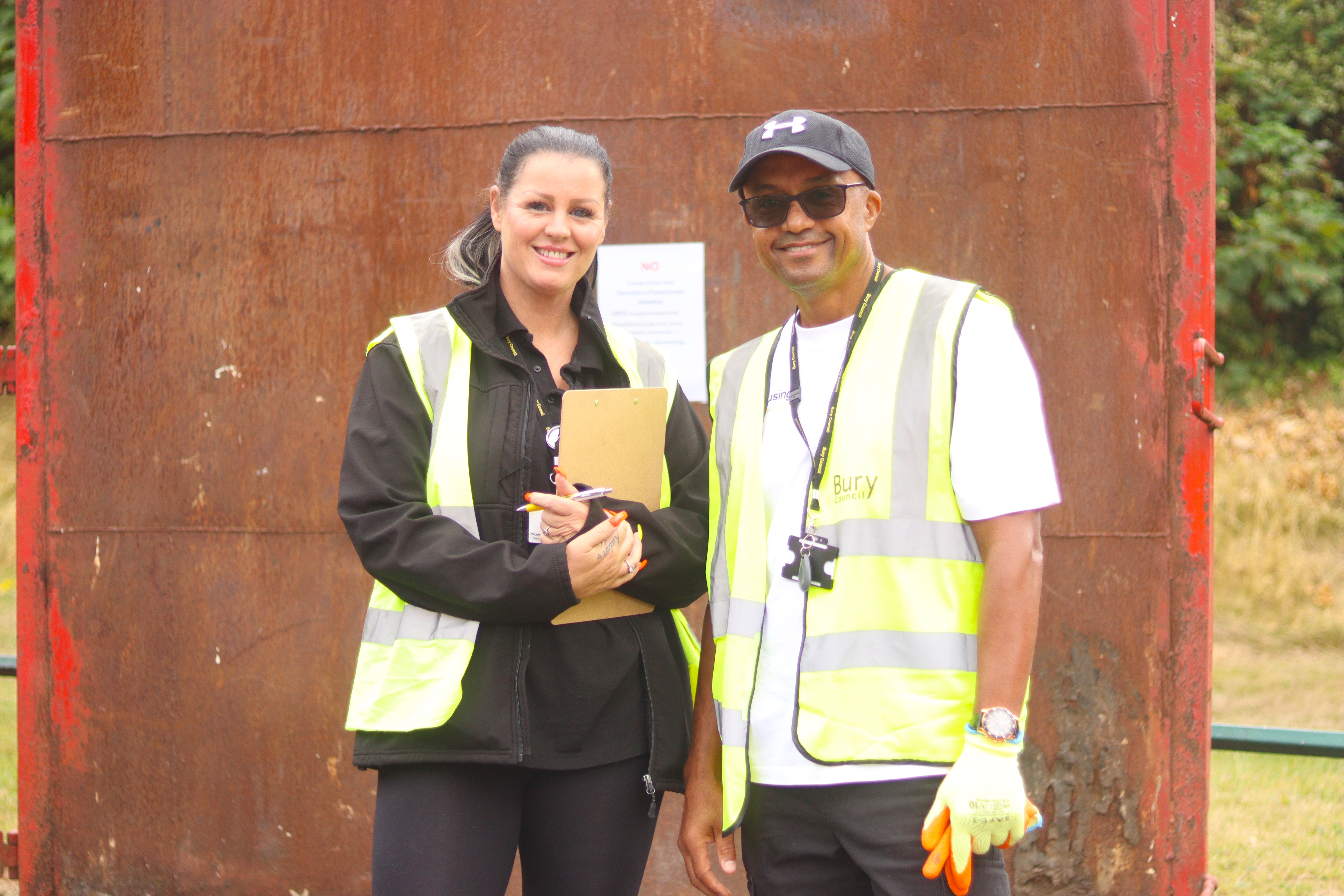 Housing staff stood by skip