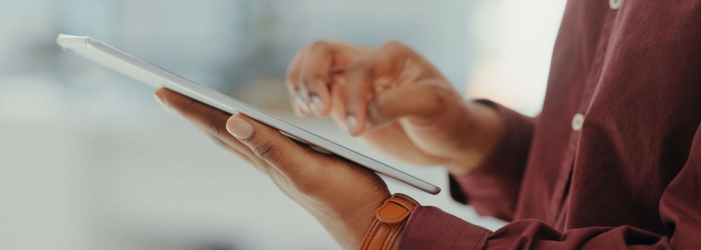 person holding a tablet