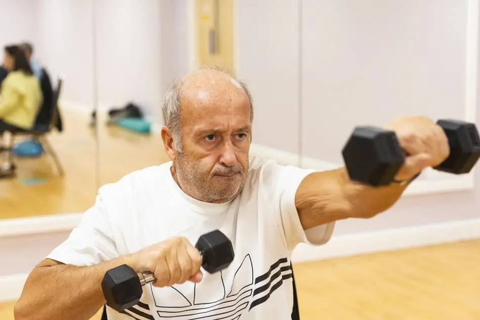 Person exercising with weights.