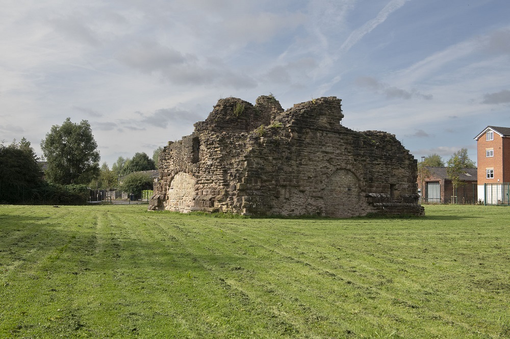 Brick remains in field.