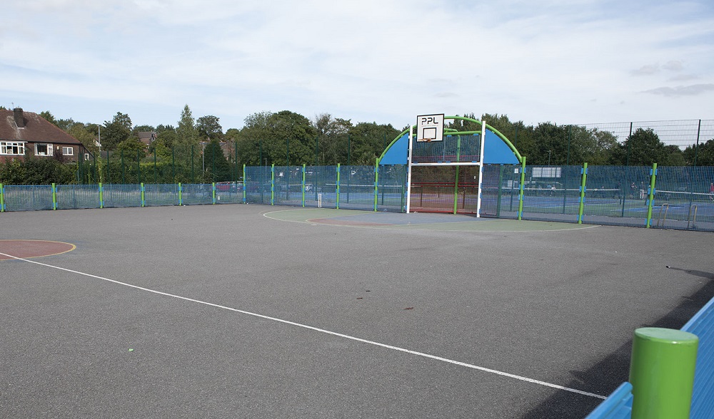 Fenced multi-ball goals and play area.