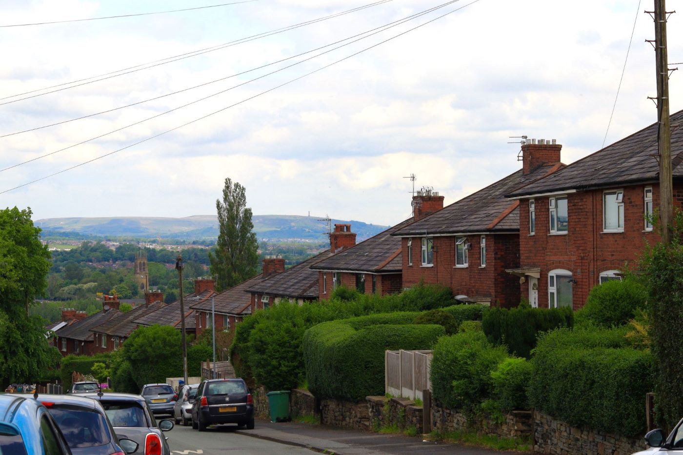 Row of house with a view to Holcombe Hill