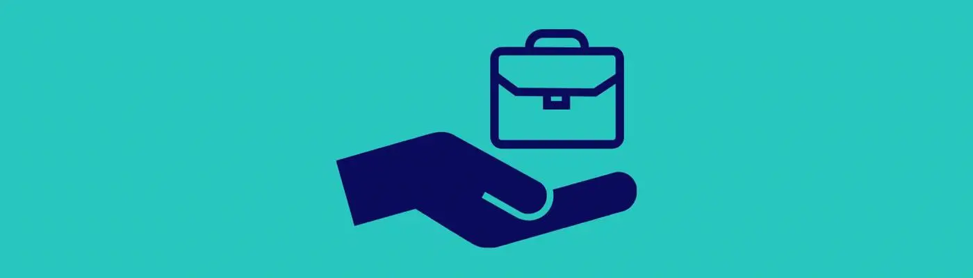 A hand holding a brief case.