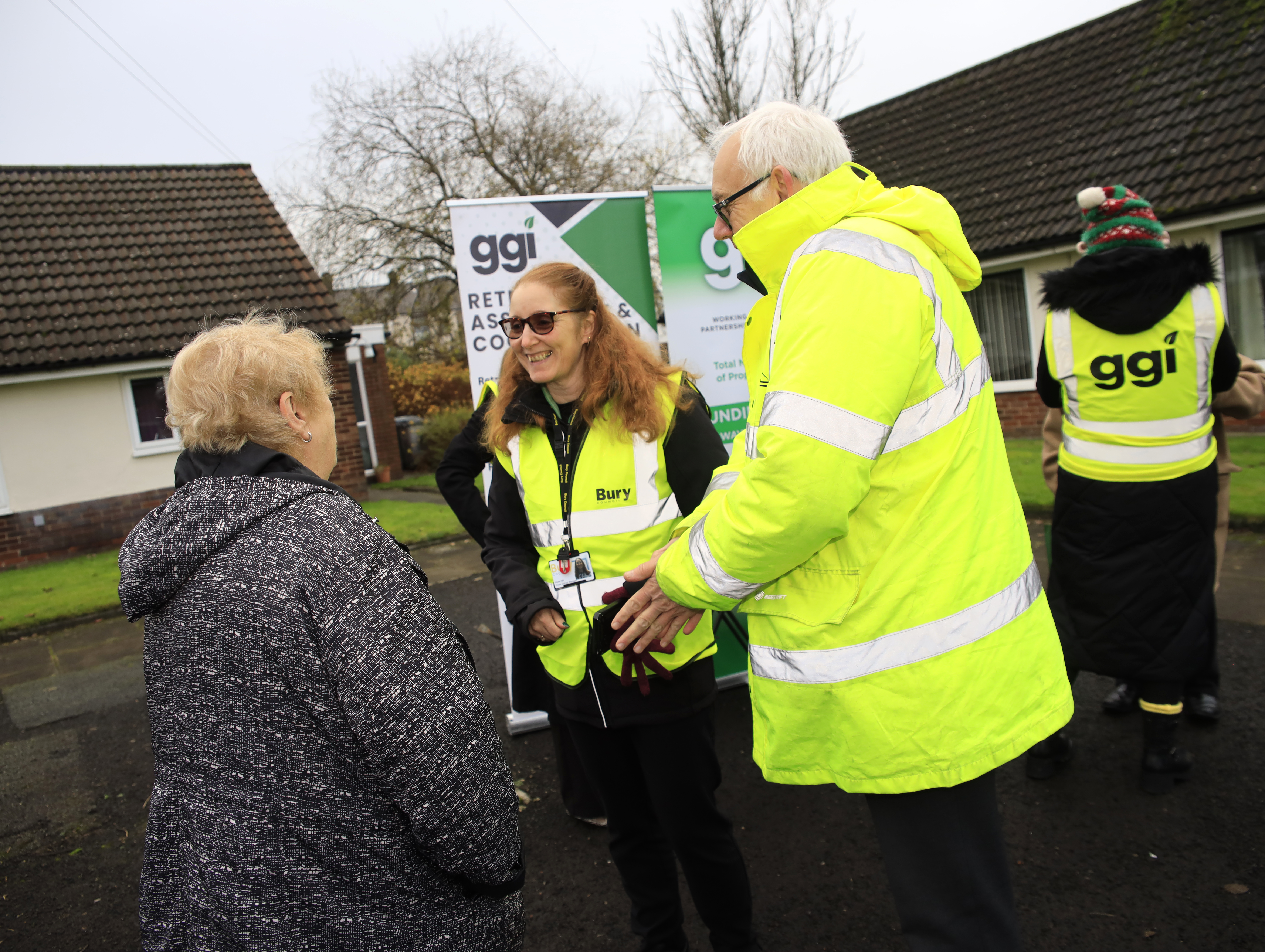 GGI and Council staff talking to tenant