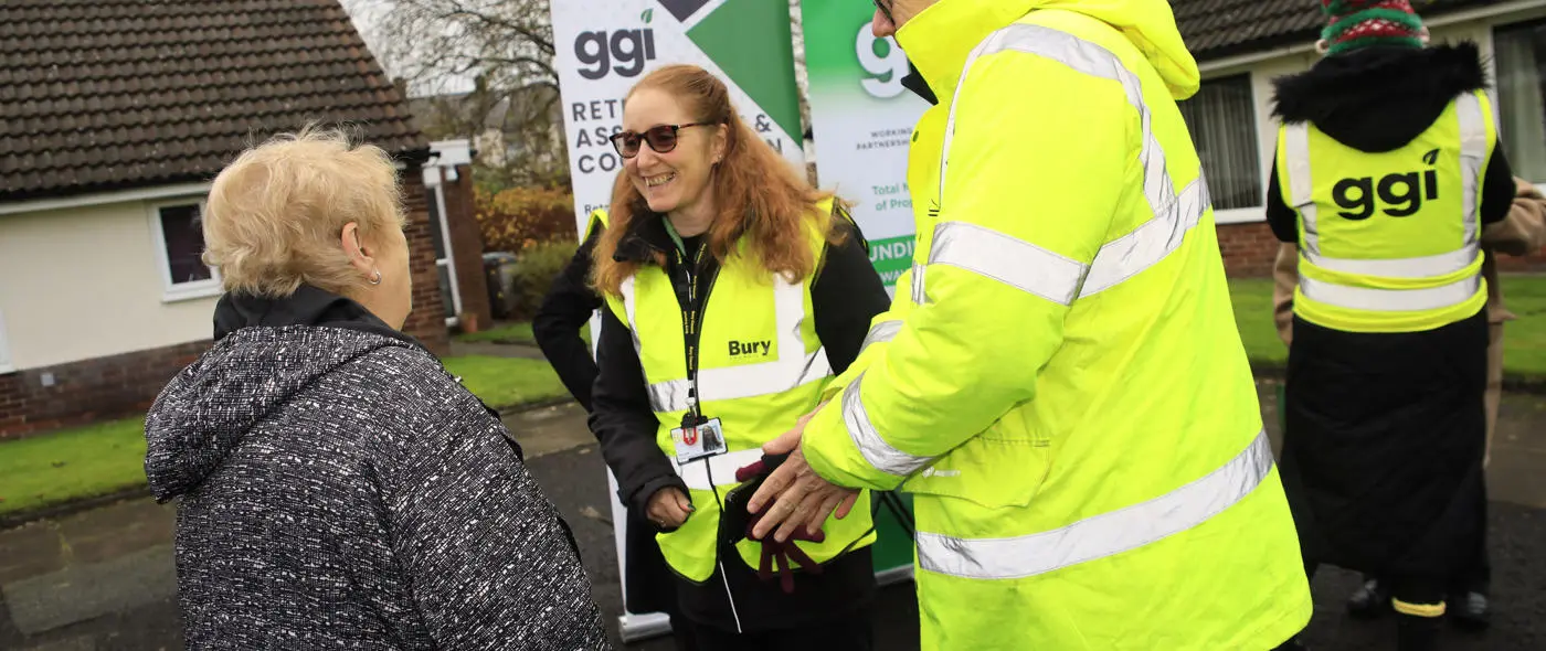 GGI and Council staff talking to tenant