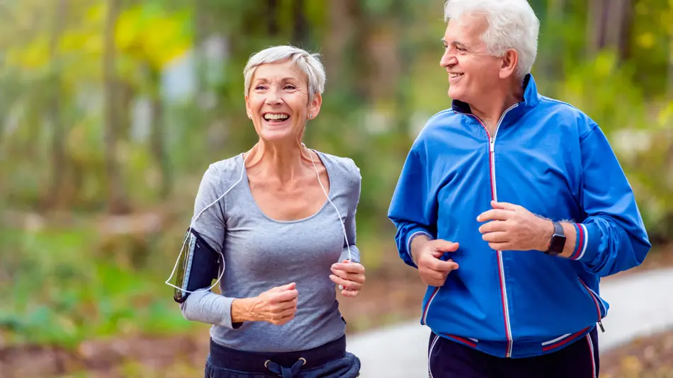 Two people running together.