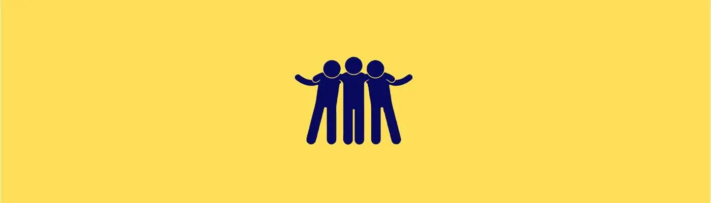 a group of three people hugging