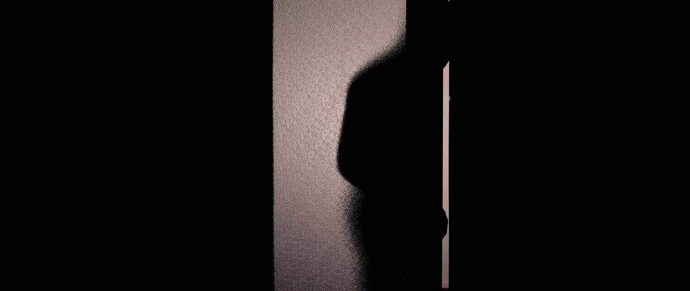 hooded man at door