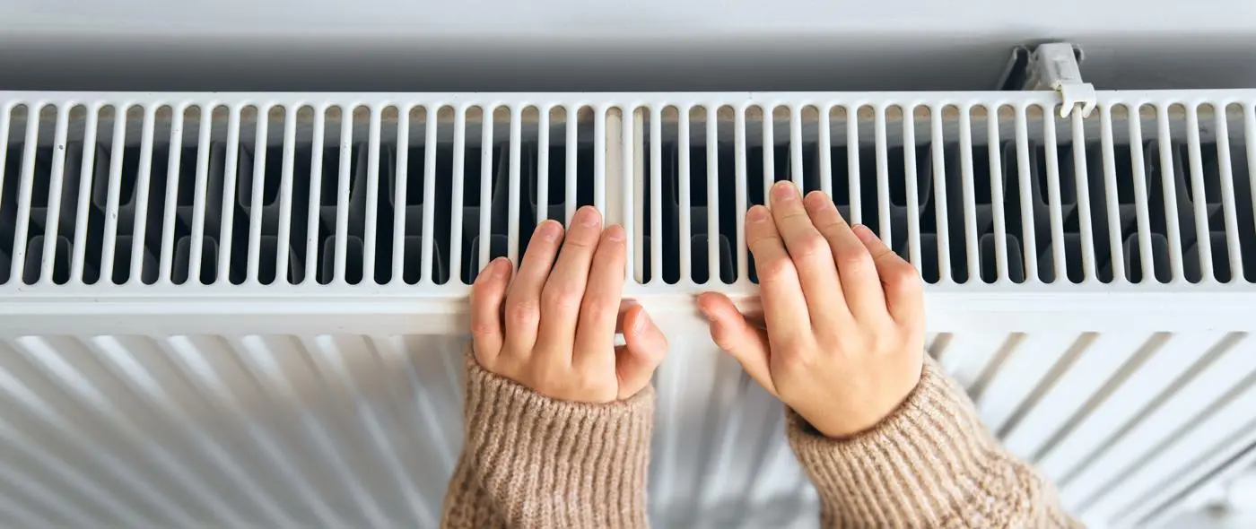 hands on a radiator