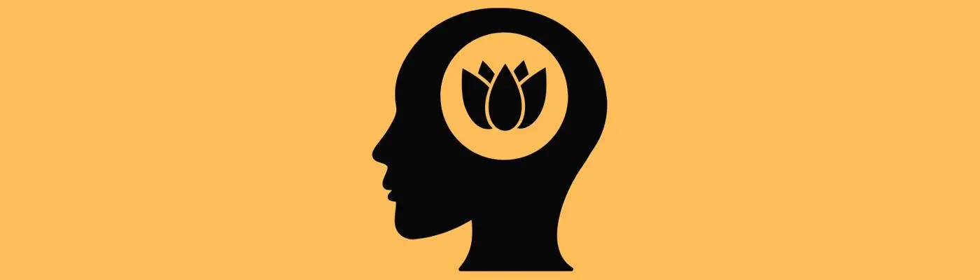 outline of a head with a lotus plant where the brain is
