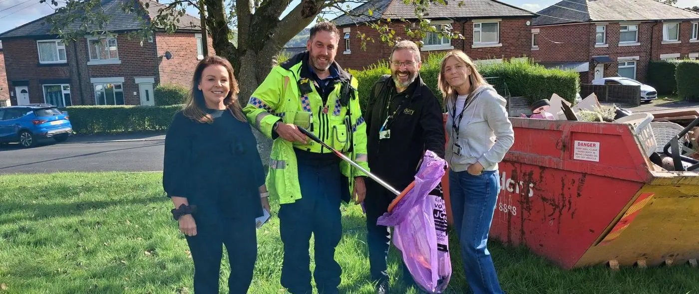 police and housing staff litter picking