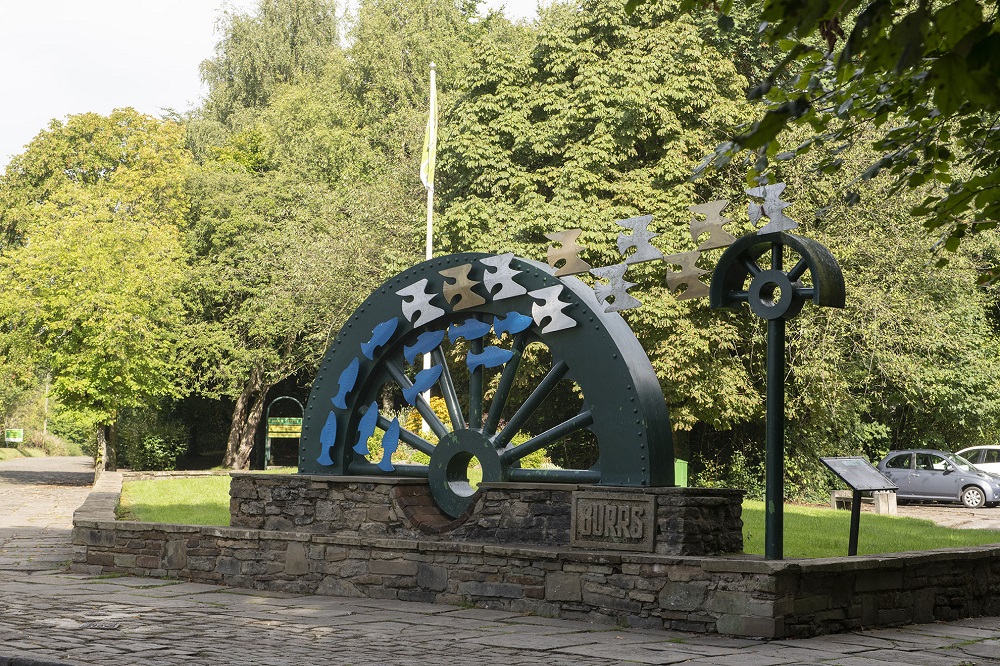 Industrial water wheel sculpture at Burrs park.