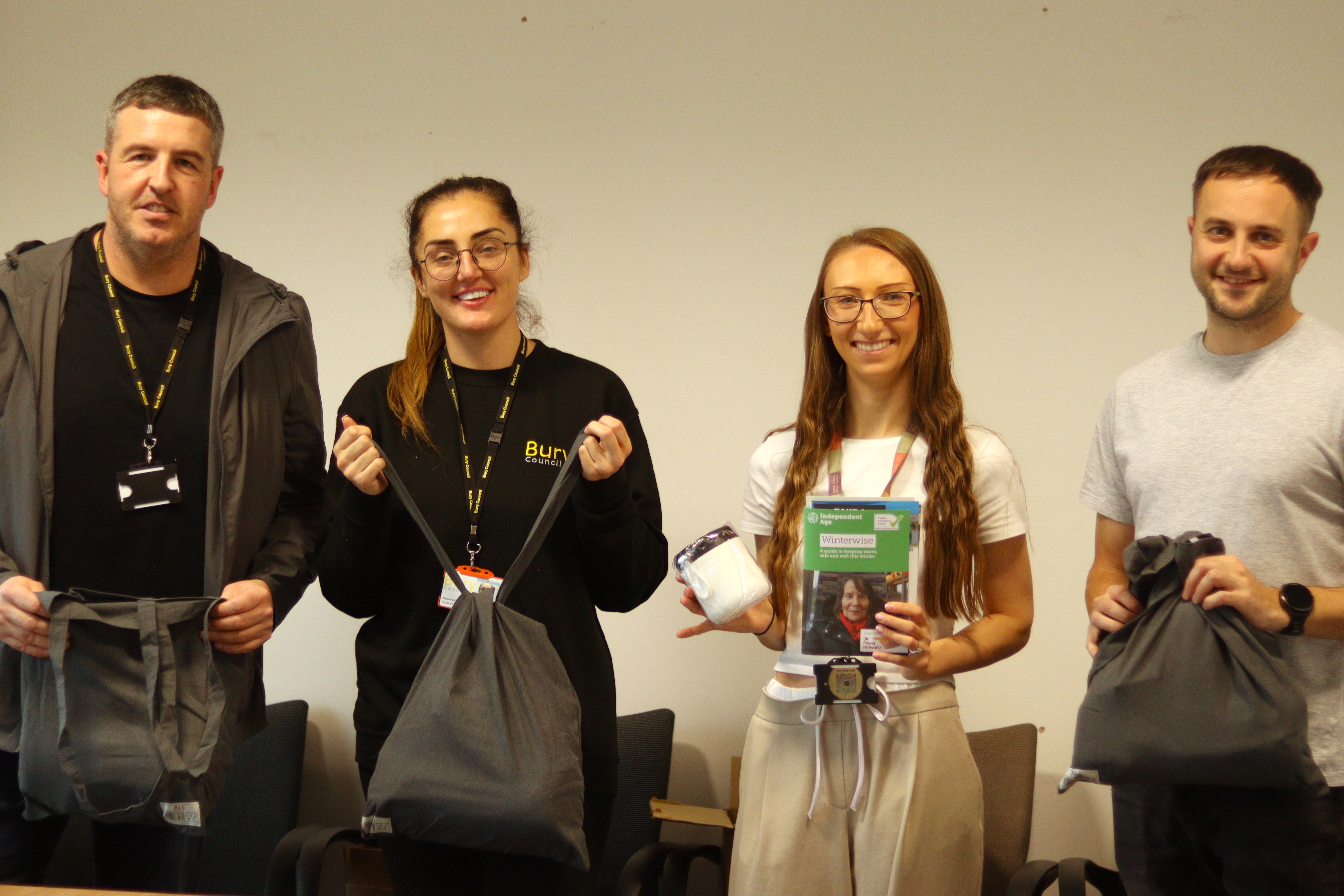 A group of people preparing the winter warmer packs