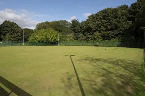 Bowls on a bowling green.