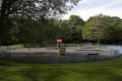 Swings, benches, climbing frames at Hamilton Road Park.