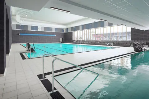 Large indoor 6-lane swimming pool and small pool